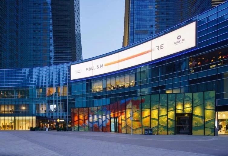 Large outdoor LED display installed across a commercial facade